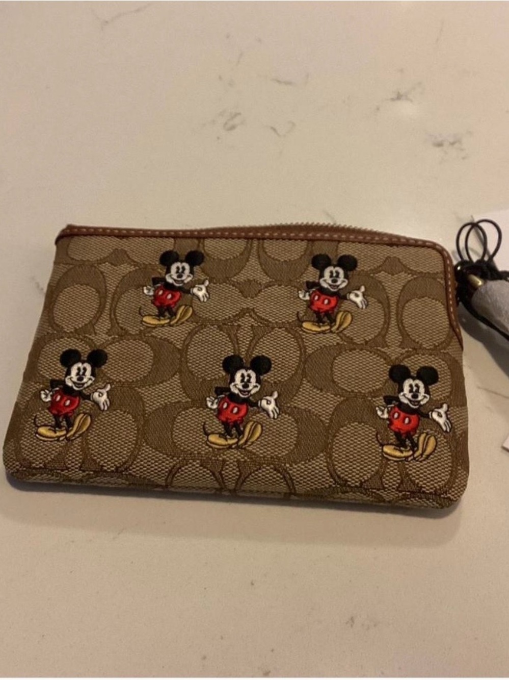 Coach Brown Signature Canvas Wristlet with Embroidered Mickeys